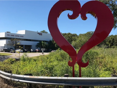 Rustic Steel Creations Donates “Largest Heart in Tampa Bay” to the Crisis Center of Tampa Bay